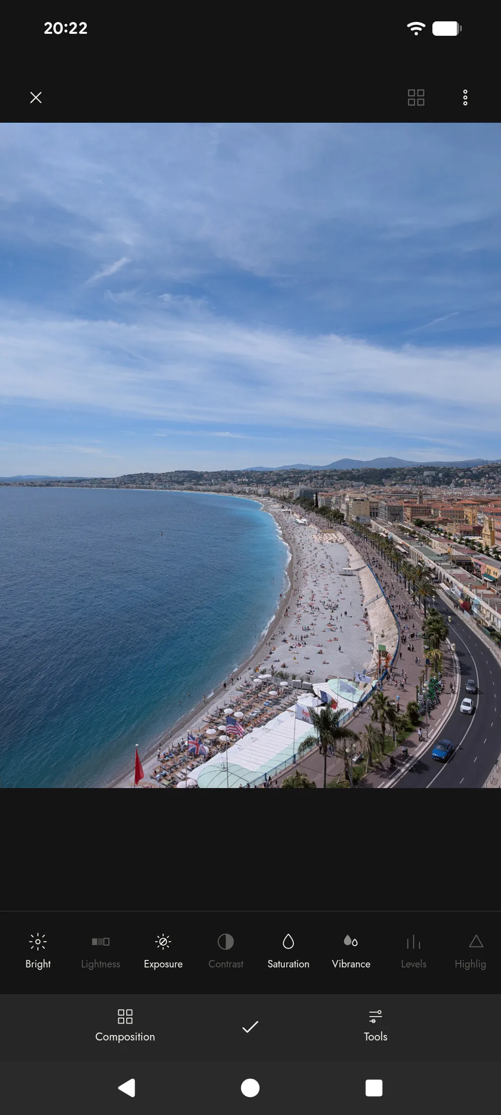 Photograph of a coastline before colour adjustment